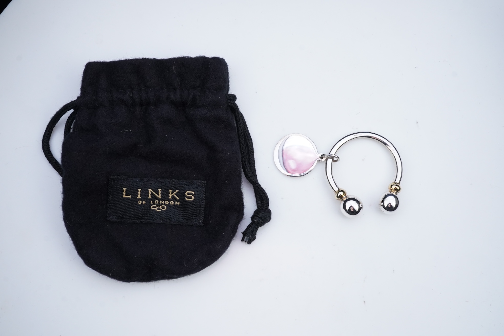 A Links of London Keyring and earrings with original boxes.